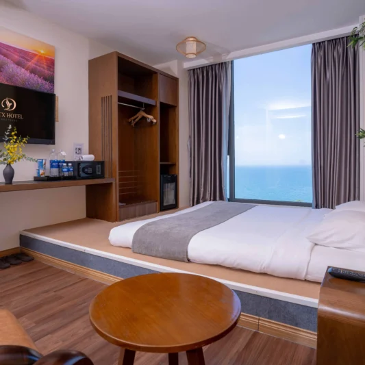 Deluxe Ocean View room at DTX Hotel Nha Trang with modern interior and ocean view