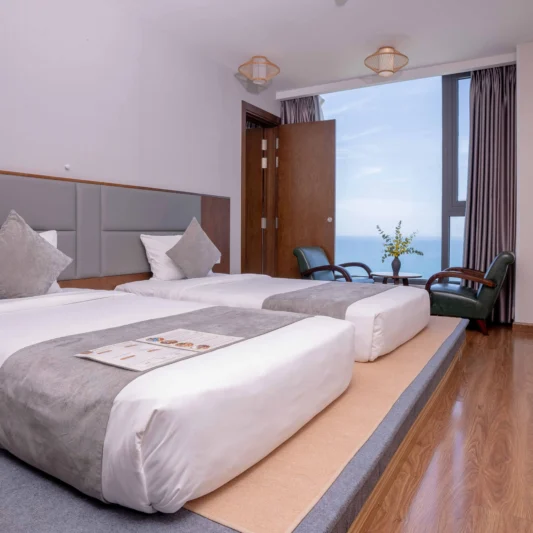 Deluxe Ocean View room at DTX Hotel Nha Trang with modern interior and ocean view