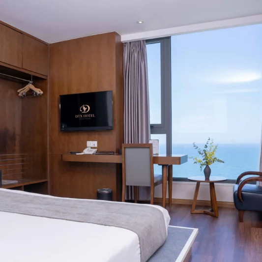 Deluxe Ocean View room at DTX Hotel Nha Trang with modern interior and ocean view