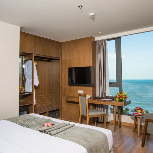 Deluxe Ocean View room at DTX Hotel Nha Trang with modern interior and ocean view
