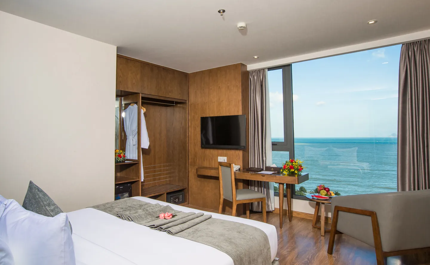 Deluxe Ocean View room at DTX Hotel Nha Trang with modern interior and ocean view
