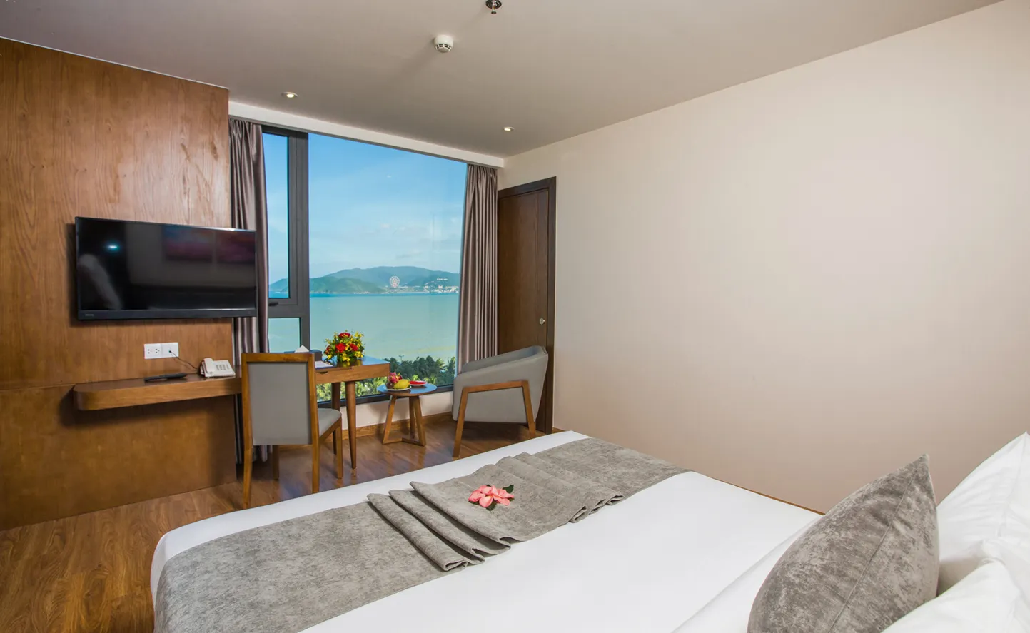 Deluxe Ocean View room at DTX Hotel Nha Trang with modern interior and ocean view