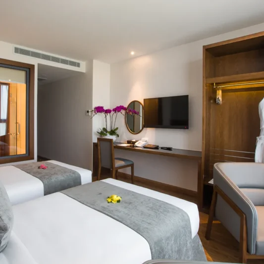 Deluxe Ocean View room at DTX Hotel Nha Trang with modern interior and ocean view