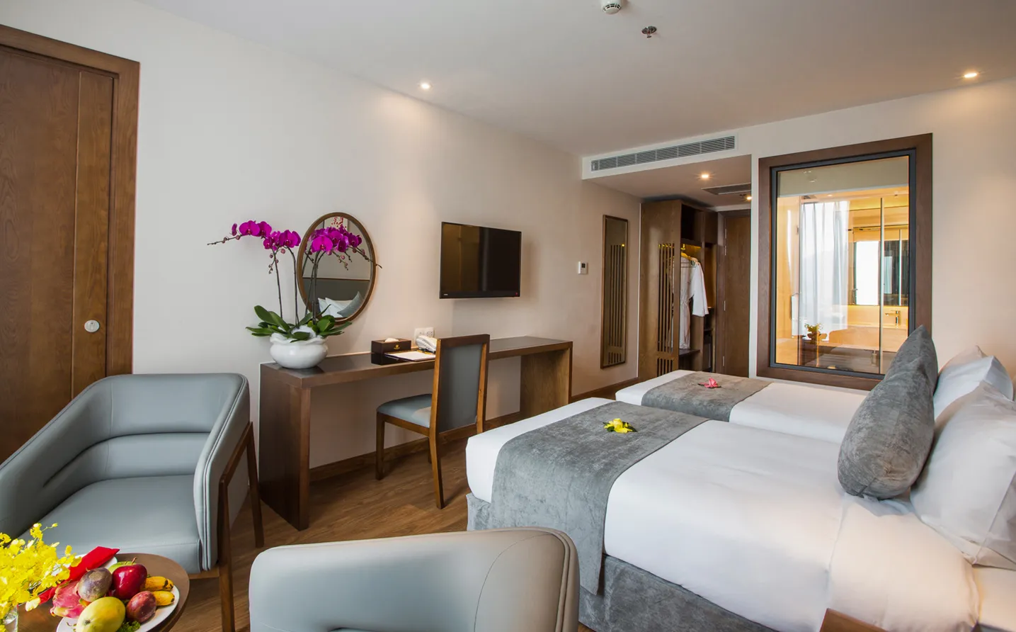 Deluxe City View room at DTX Hotel Nha Trang with modern design and city skyline