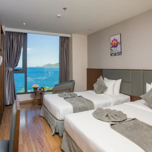 Deluxe Ocean View room at DTX Hotel Nha Trang with modern interior and ocean view