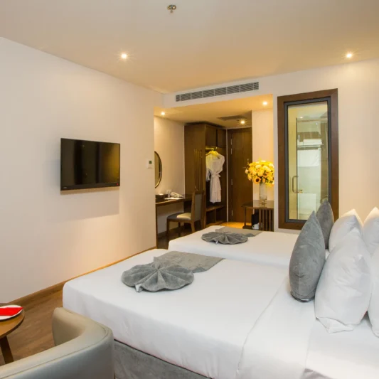 Deluxe Ocean View room at DTX Hotel Nha Trang with modern interior and ocean view