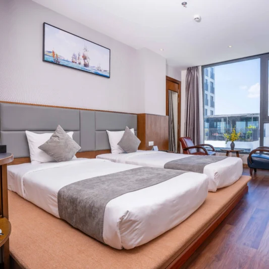 Deluxe City View room at DTX Hotel Nha Trang with modern design and city skyline