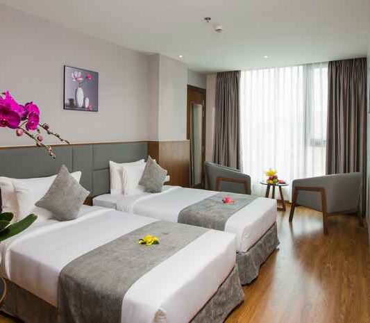 Superior City View room at DTX Hotel Nha Trang with modern design and city skyline view