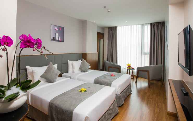 Superior City View room at DTX Hotel Nha Trang with modern design and city skyline view