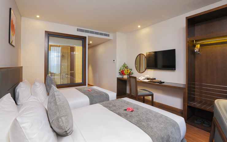 Superior City View room at DTX Hotel Nha Trang with modern design and city skyline view