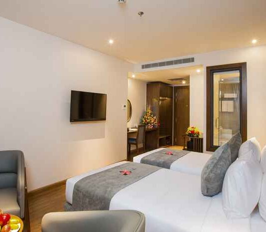 Superior City View room at DTX Hotel Nha Trang with modern design and city skyline view