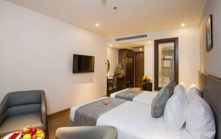 Superior City View room at DTX Hotel Nha Trang with modern design and city skyline view